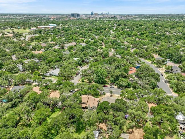 The location blends convenience with a connection to nature—where neighborhood sidewalks meet greenbelt trails, and city life never feels too far (or too close) | Image 36