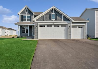 Photo is of the actual home. Stunning curb appeal! | Image 1