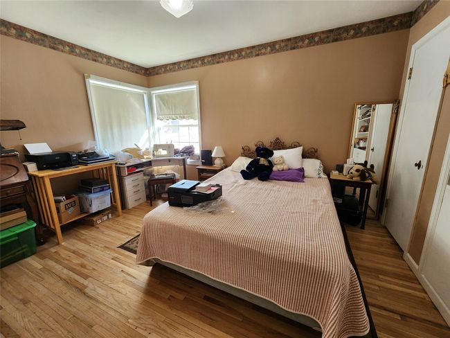 Bedroom featuring light wood-type flooring | Image 31