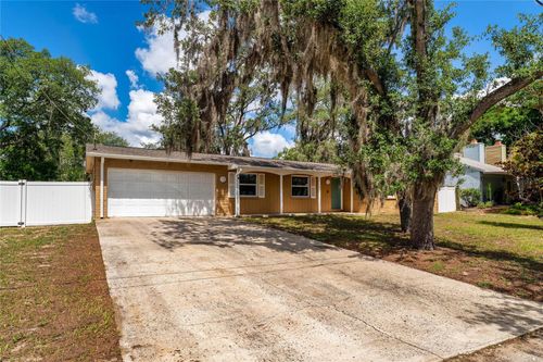 10214 N Woodmere Rd, TAMPA, FL, 33617-3462 | Card Image