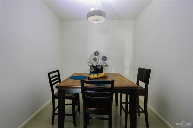 Dining area featuring baseboards | Image 9
