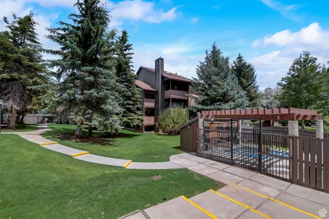 View of home's community featuring a yard | Image 21