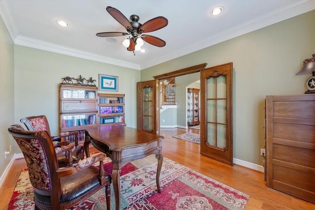 Home office/study with lovely view into the entry and dining room | Image 5