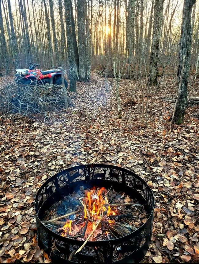 Firepit and wooded trails | Image 12