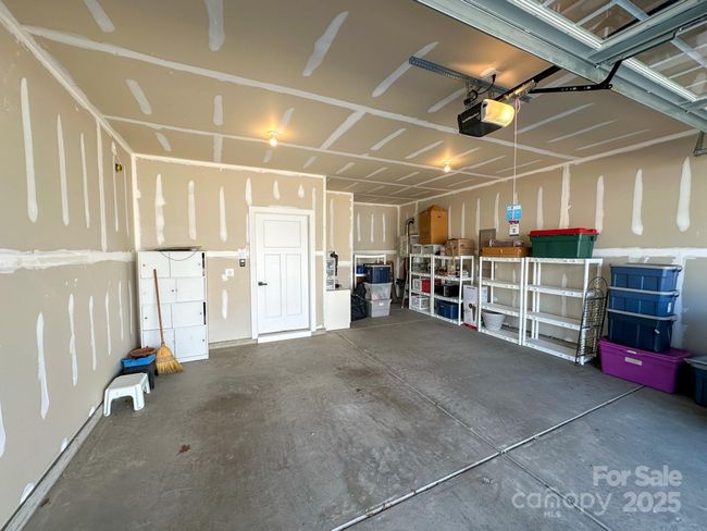 Tankless water heater located in garage. | Image 17