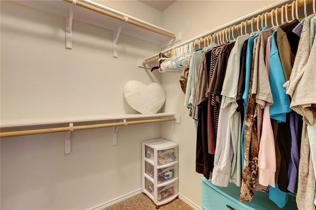 Walk in closet with carpet flooring | Image 23