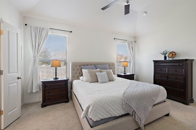 Primary suite is generously sized and set apart from secondary bedrooms. | Image 21