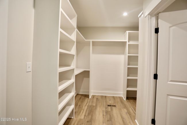 Double sided custom closet wood shelving | Image 25