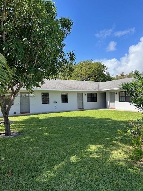 1099 Ne 35th St, Oakland Park, FL, 33334-2803 | Card Image