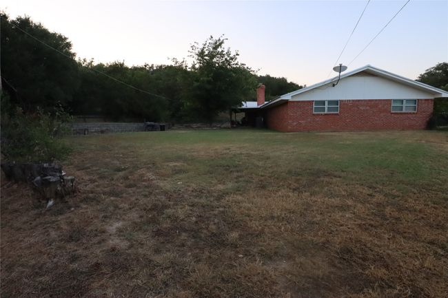 907 Cherry St, House other with 4 bedrooms, 3 bathrooms and null parking in Ranger TX | Image 4