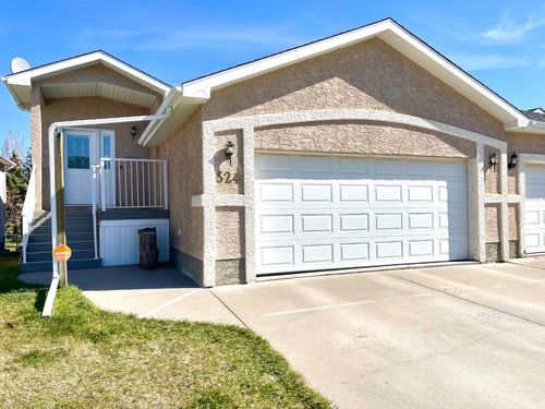 524 Lineham Acres Drive Nw, Home with 4 bedrooms, 2 bathrooms and 4 parking in High River AB | Card Image