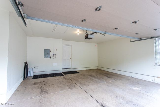 Garage featuring electric panel | Image 33
