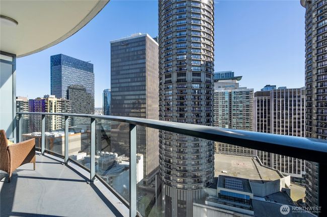 Expansive balcony with stunning views of the city skylined. | Image 16