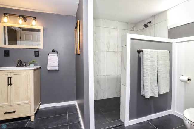 Walk-in tile shower from walk-in closet | Image 31