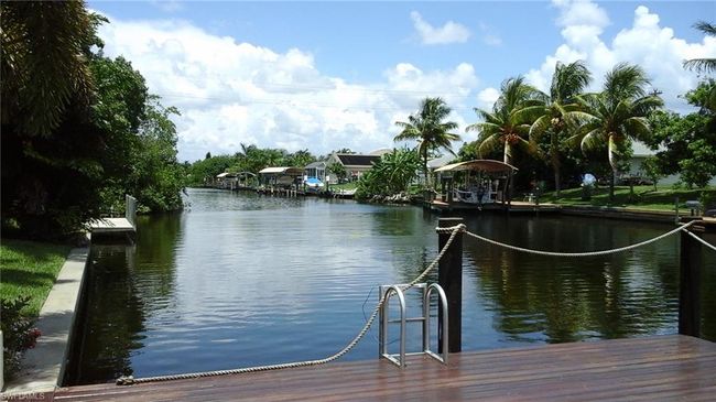 Dock area featuring a water view | Image 39