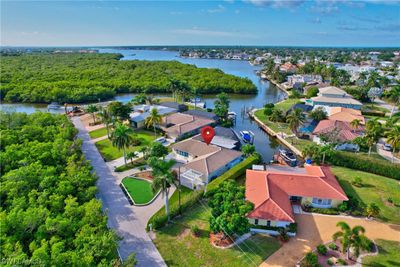 Short canal leads out to Naples Bay and the Gulf. It is only 10 minutes from dock to Gulf. | Image 1