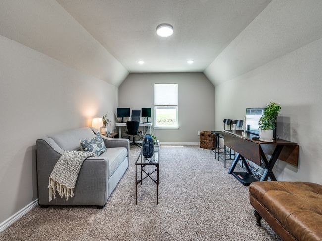 Office area with carpet floors, lofted ceiling, and baseboards | Image 21