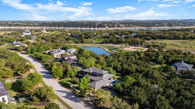 Birds eye view of property with a water view and a residential view | Image 35