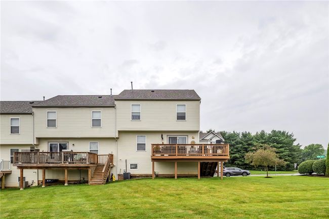 The expansive common area behind the unit is a gathering area for community picnics, kickball games, movies and more! | Image 4
