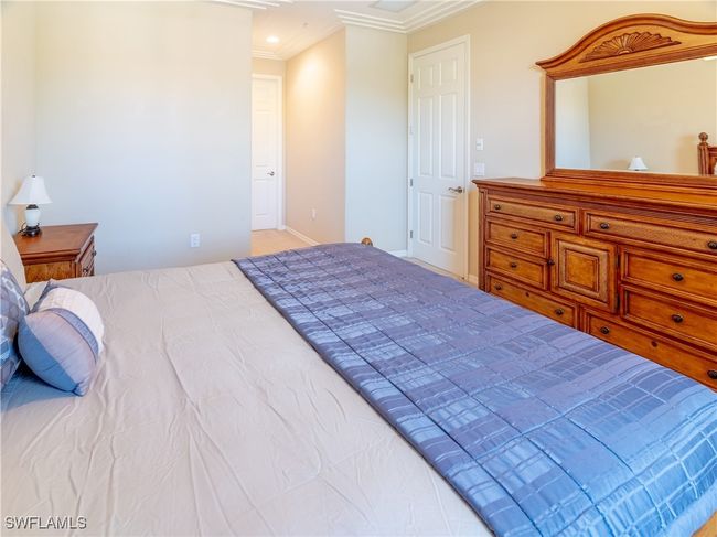 Bedroom with crown molding | Image 15