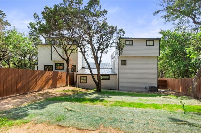 The large fenced-in backyard is another great outdoor living space. | Image 29