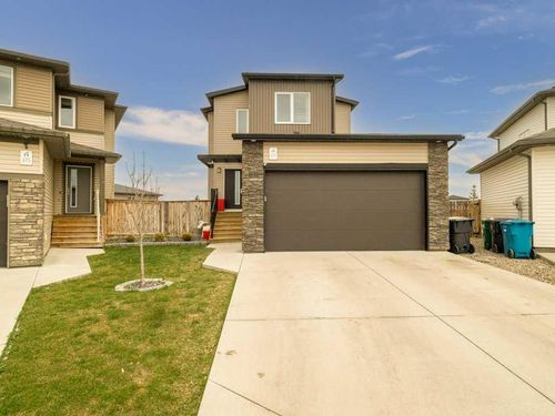 619 Mount Sundance Bay W, Home with 3 bedrooms, 3 bathrooms and 4 parking in Lethbridge AB | Card Image