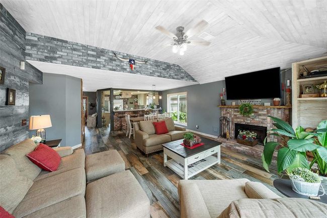 This digitally altered image showcases multiple design possibilities for a single space. The photo has been enhanced to illustrate variations in wall colors and lighting styles. Allowing viewers to visualize how the same room can be transformed through different design choices. | Image 12