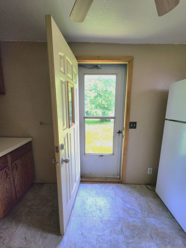 Kitchen door to backyard | Image 11