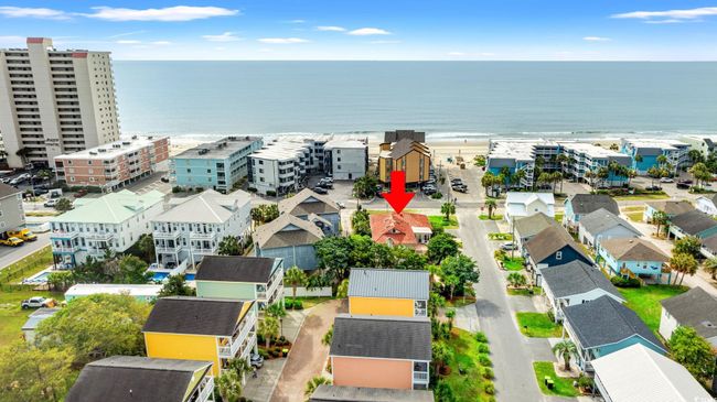 Drone / aerial view of home across from Ocean | Image 7