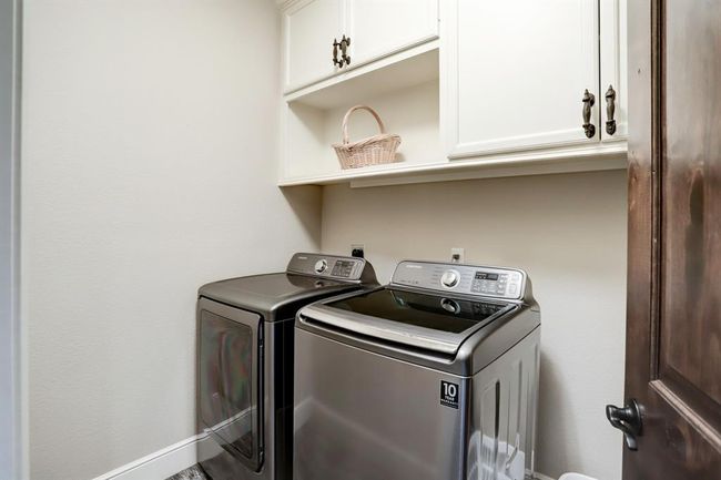 Upstairs laundry room. | Image 44