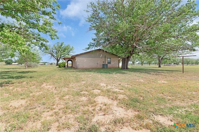 South side of ranch home | Image 7