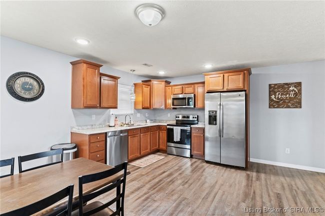1128 Grassy Meadow Ct, Home with 3 bedrooms, 2 bathrooms and null parking in Scottsburg IN | Image 5