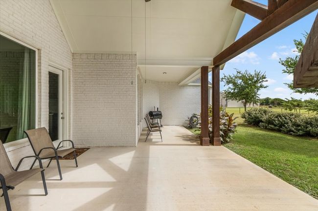 Large covered patio with cedar beams | Image 30