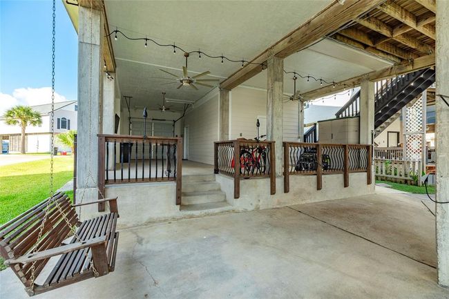Outdoor area has multiple levels for seating and entertaining | Image 38