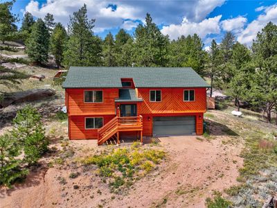 This beautifully updated property sits on over 3 acres, offering stunning mountain views and unmatched privacy | Image 1