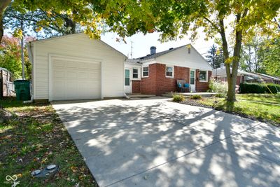 This home is located walking distance to Arbuckle Park, downtown Main Street dining and businesses. It's prime location for Brownsburg! Especially when it's 4th of July, you can walk to the festivals. | Image 2