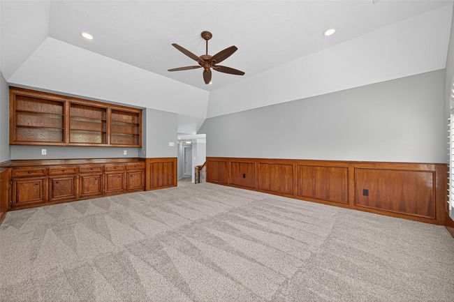 Media room has wonderful built-ins with plenty of storage. | Image 30
