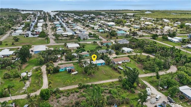 Aerial view of property and surrounding area with nearby suburban area | Image 43