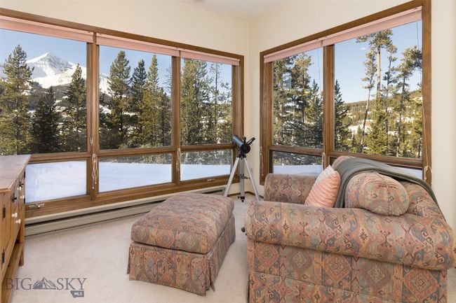 Sunroom / solarium with a mountain view and a baseboard heating unit | Image 7