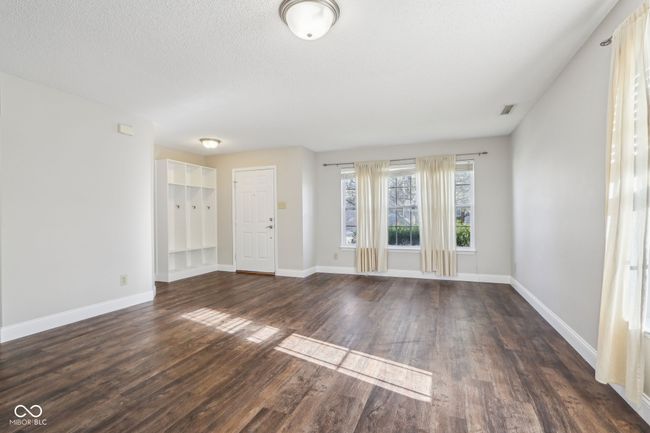 Formal dining area, or great for entertainment feature, maybe a pool table, or Piano | Image 13