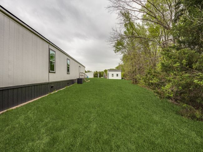 View of yard with central AC | Image 18