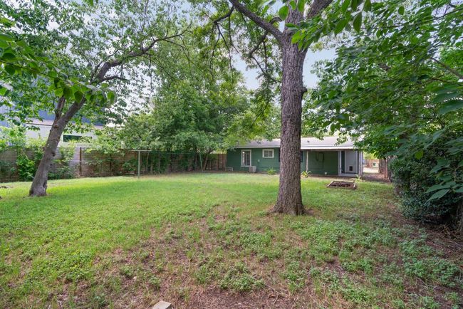 Views of the expansive backyard, providing plenty of space for outdoor fun. | Image 20