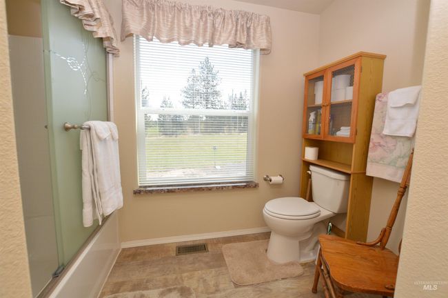 Full bath with plenty of natural light | Image 22
