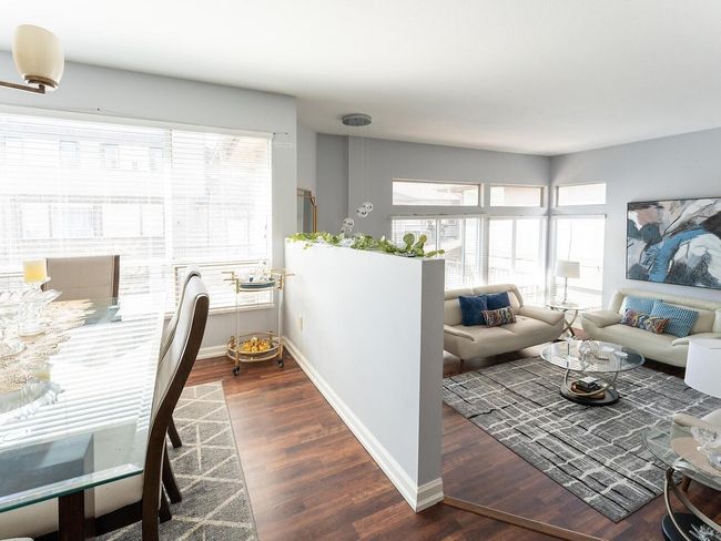 Interior space with baseboards and wood finished floors | Image 8