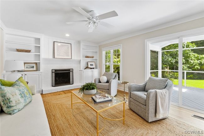 Another view of family room with view to rear screened in porch. | Image 22