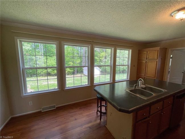 8004 Smithstone Ct, House other with 3 bedrooms, 2 bathrooms and null parking in Summerfield NC | Image 7