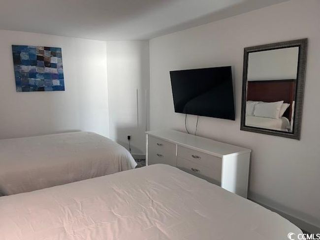 Bedroom featuring baseboards | Image 12
