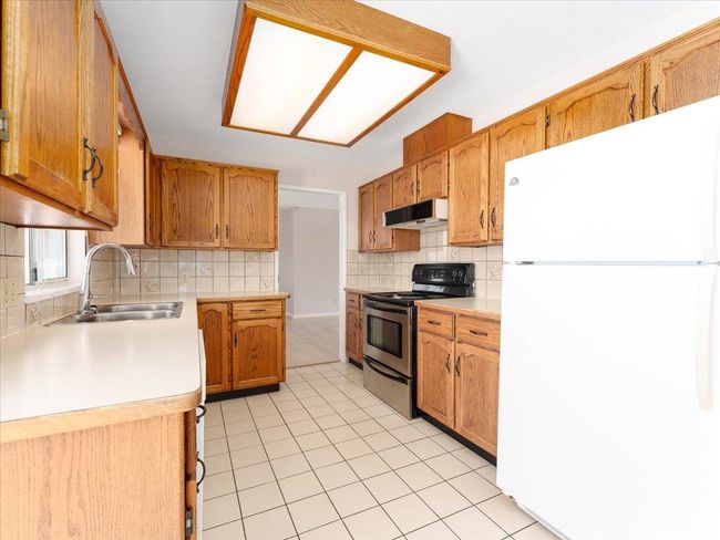 13357 79 Ave, House other with 4 bedrooms, 3 bathrooms and 12 parking in Surrey BC | Image 12