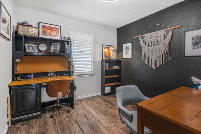 Office area featuring wood finished floors and baseboards | Image 19