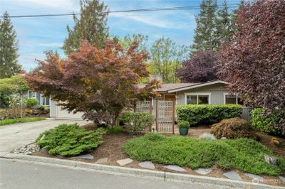 Pristine landscaping surrounds this Mercer Island oasis. | Image 1